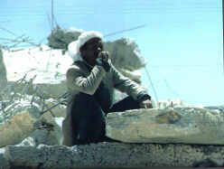 Palestinian Man Weeps on the Remains of his Demolished Home (6 Kb): Christian Peacemaker Team photo