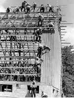 Barn-raising (7 Kb): Used by permission of the Kitchener-Waterloo Record Photographic Negative Collection; Dana Porter Library, University of Waterloo; Waterloo, Ont. N2L 3G1 (CGC 1990 - 9.1)